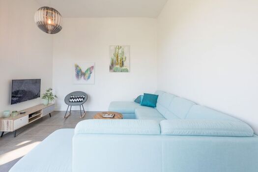 Georgs Huis - Bequeme Sofalandschaft lädt zum verweilen ein 